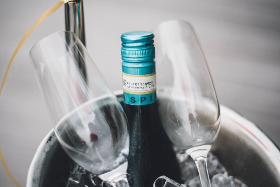 Wine glasses and bottles on the counter